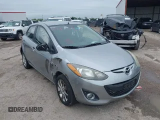 2013 Mazda 2 Touring z VIN JM1DE1LY3D0161278, wystawiony jako IAAI lot #41945739 z przebiegiem 132 285 mil mil oraz . Historia ofert i sprzedaży dostępna na DreamBid. Obrazek 1.