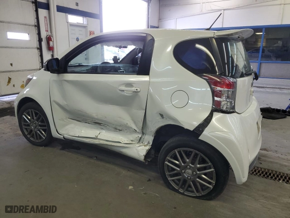 2012 Scion iQ with VIN JTNJJXB02CJ011910, listed as a Copart auction lot 77388604 with 0 mi miles and Salvage Title. Bid and sale history available at carsss.com. Image 2.