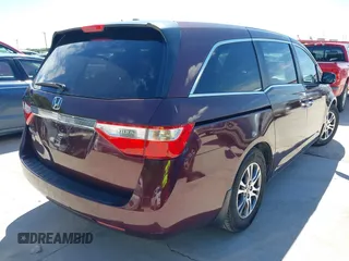 2011 Honda Odyssey EX-L with VIN 5FNRL5H60BB094647, listed as a IAAI auction lot 42223712 with 202,612 mi miles and . Bid and sale history available at carsss.com. Image 4.