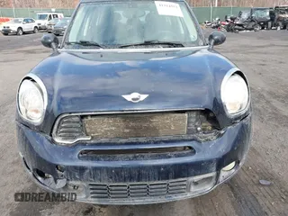 2013 MINI Countryman S ALL4 with VIN WMWZC5C58DWP30936, listed as a IAAI auction lot 41314553 with 128,405 mi miles and . Bid and sale history available at DreamBid. Image 6.