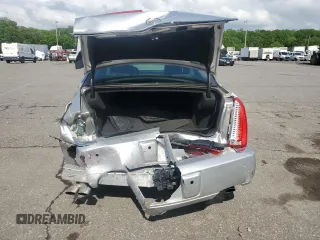 2009 Cadillac DTS 1SA z VIN 1G6KD57Y19U136085, wystawiony jako Copart lot #56983425 z przebiegiem 115 468 mil mil oraz Czysty tytuł • Clean title. Historia ofert i sprzedaży dostępna na DreamBid. Obrazek 6.