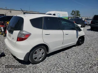 2009 Honda Fit with VIN JHMGE88229S057028, listed as a Copart auction lot 50776515 with 0 mi miles and Salvage Title. Bid and sale history available at carsss.com. Image 3.