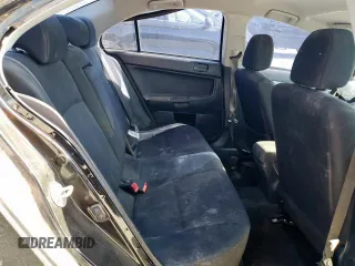 2015 Mitsubishi Lancer ES z VIN JA32U2FU8FU006101, wystawiony jako Copart lot #58006895 z przebiegiem Nie podano mil oraz Czysty tytuł • Clean title. Historia ofert i sprzedaży dostępna na DreamBid. Obrazek 10.