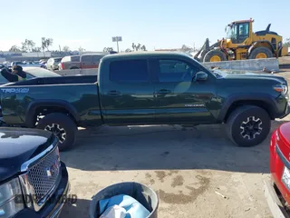 2021 Toyota Tacoma 4WD SR5 with VIN 3TMDZ5BN2MM101265, listed as a IAAI auction lot 41272874 with 51,989 mi miles. Bid and sale history available at carsss.com. Image 14.