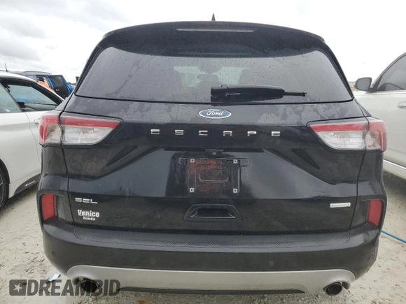 2020 Ford Escape SEL with VIN 1FMCU0H61LUB07822, listed as a Copart auction lot 73777834 with Not provided miles and Salvage title. Bid and sale history available at DreamBid. Image 6.