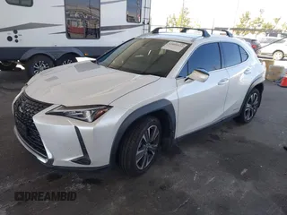 2022 Lexus UX 250h with VIN JTHX9JBH5N2054854, listed as a IAAI auction lot 42009922 with 57,944 mi miles and . Bid and sale history available at DreamBid. Image 2.
