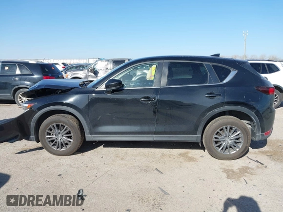 2020 Mazda CX-5 Touring with VIN JM3KFACM0L0780265, listed as a IAAI auction lot 41825873 with 151,888 mi miles. Bid and sale history available at carsss.com. Image 14.