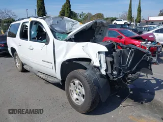 2013 Chevrolet Suburban LT with VIN 1GNSCJE02DR252050, listed as a IAAI auction lot 41604964 with 1 mi miles. Bid and sale history available at carsss.com. Image 1.
