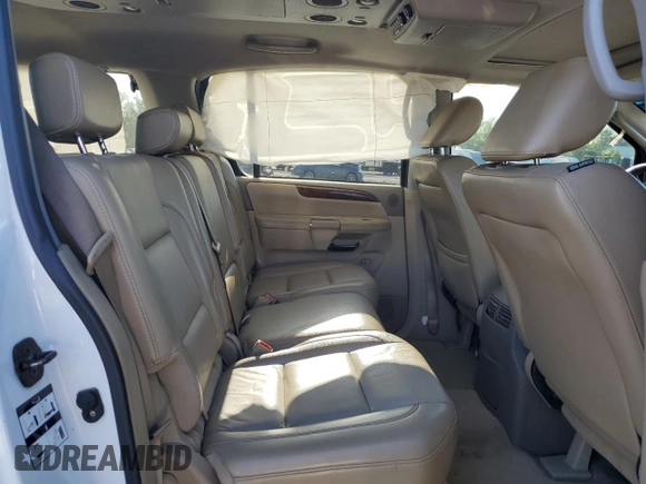 2011 Nissan Armada Platinum z VIN 5N1AA0NC2BN620032, wystawiony jako Copart lot #52098665 z przebiegiem Nie podano mil oraz Szkoda całkowita • Salvage title. Historia ofert i sprzedaży dostępna na DreamBid. Obrazek 11.