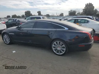 2015 Jaguar XJ with VIN SAJWA2GZ4F8V86379, listed as a Copart auction lot 42624615 with 55,803 mi miles and Salvage Title. Bid and sale history available at carsss.com. Image 2.