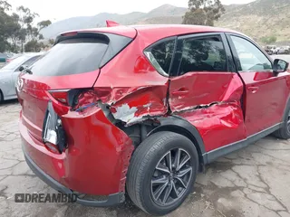 2018 Mazda CX-5 Grand Touring with VIN JM3KFADMXJ0302656, listed as a IAAI auction lot 42099173 with 125,378 mi miles and . Bid and sale history available at DreamBid. Image 6.