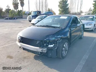 2009 Honda Civic Cpe EX with VIN 2HGFG11889H513071, listed as a IAAI auction lot 41233682 with 148,404 mi miles. Bid and sale history available at carsss.com. Image 2.