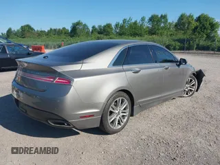 2016 Lincoln MKZ z VIN 3LN6L2GK9GR601143, wystawiony jako IAAI lot #42690132 z przebiegiem 155 073 mil mil oraz . Historia ofert i sprzedaży dostępna na DreamBid. Obrazek 4.