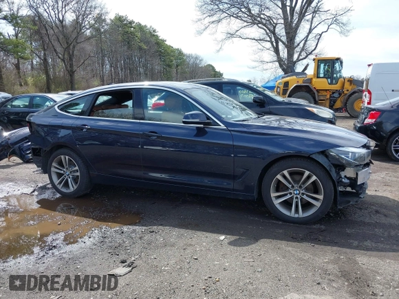 2018 BMW 3 Series 330i xDrive with VIN WBA8Z9C54JG828207, listed as a IAAI auction lot 42000931 with 73,736 mi miles. Bid and sale history available at carsss.com. Image 14.
