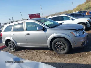 2019 Dodge Journey SE with VIN 3C4PDCBB6KT835643, listed as a IAAI auction lot 40702227 with 99,691 mi miles and . Bid and sale history available at DreamBid. Image 14.