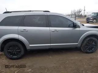 2019 Dodge Journey SE with VIN 3C4PDCBG9KT869149, listed as a IAAI auction lot 41472289 with 97,333 mi miles and . Bid and sale history available at DreamBid. Image 14.
