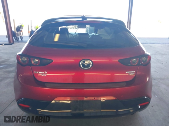 2021 Mazda 3 Premium Plus z VIN JM1BPBNY3M1332643, wystawiony jako IAAI lot #41536777 z przebiegiem 43 075 mil mil oraz . Historia ofert i sprzedaży dostępna na DreamBid. Obrazek 16.