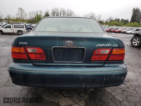 1998 Toyota Avalon XL with VIN 4T1BF18B6WU242906, listed as a Copart auction lot 52385935 with 108,802 mi miles and Salvage Title. Bid and sale history available at DreamBid. Image 6.