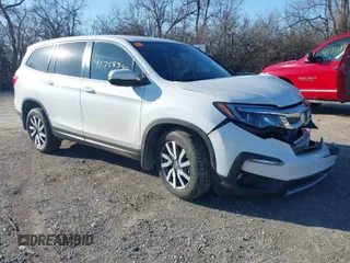 2021 Honda Pilot EX-L with VIN 5FNYF6H56MB049800, listed as a IAAI auction lot 41758949 with 64,098 mi miles. Bid and sale history available at carsss.com. Image 1.