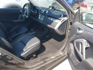 2012 Smart fortwo Pure z VIN WMEEJ3BAXCK526477, wystawiony jako IAAI lot #42392611 z przebiegiem 143 378 mil mil oraz . Historia ofert i sprzedaży dostępna na DreamBid. Obrazek 5.