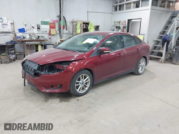 2015 Ford Focus SE with VIN 1FADP3F21FL270827, listed as a IAAI auction lot 42665015 with 162,745 mi miles and . Bid and sale history available at DreamBid. Image 2.