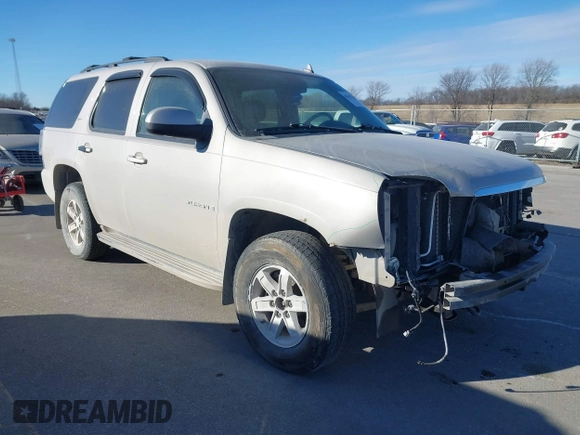 2009 GMC Yukon SLT w/4SA with VIN 1GKFK33039J117245, listed as a IAAI auction lot 41421302 with 199,864 mi miles. Bid and sale history available at carsss.com. Image 1.