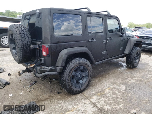 2013 Jeep Wrangler Unlimited Rubicon 10th Anniversary with VIN 1C4HJWFGXDL543660, listed as a Copart auction lot 61462104 with 115,897 mi miles and Salvage title. Bid and sale history available at DreamBid. Image 3.