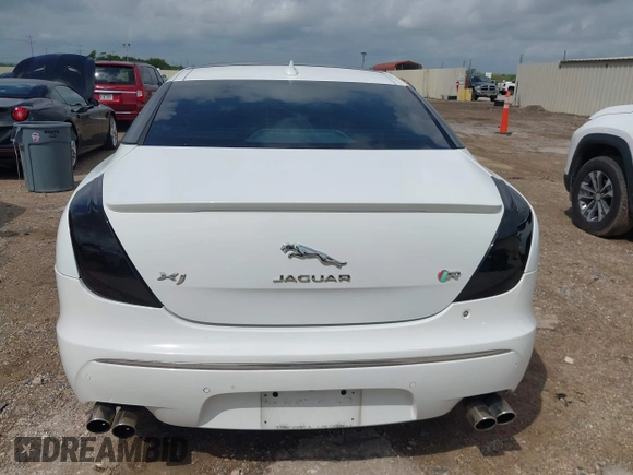 2014 Jaguar XJ R with VIN SAJWA1EK3EMV58692, listed as a IAAI auction lot 42663979 with 111,386 mi miles and . Bid and sale history available at DreamBid. Image 16.