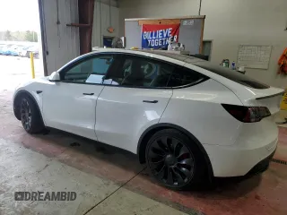2022 Tesla Model Y Performance with VIN 7SAYGDEF9NF405370, listed as a Copart auction lot 43621095 with 52,292 mi miles and Salvage Title. Bid and sale history available at DreamBid. Image 2.