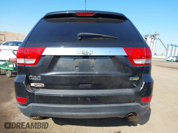 2012 Jeep Grand Cherokee Laredo with VIN 1C4RJFAG5CC118826, listed as a IAAI auction lot 42039801 with 158,153 mi miles. Bid and sale history available at carsss.com. Image 16.