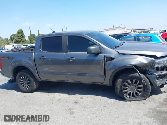 2021 Ford Ranger XL with VIN 1FTER4FHXMLD25744, listed as a IAAI auction lot 42248338 with 74,312 mi miles and . Bid and sale history available at DreamBid. Image 13.