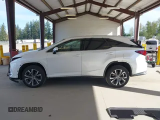2021 Lexus RX with VIN JTJHZKFA2M2030841, listed as a IAAI auction lot 42009263 with 38,113 mi miles. Bid and sale history available at carsss.com. Image 15.