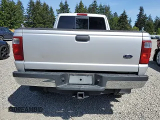 2005 Ford Ranger XLT with VIN 1FTZR45E35PA22825, listed as a Copart auction lot 58169565 with 117,956 mi miles and Salvage title. Bid and sale history available at DreamBid. Image 6.