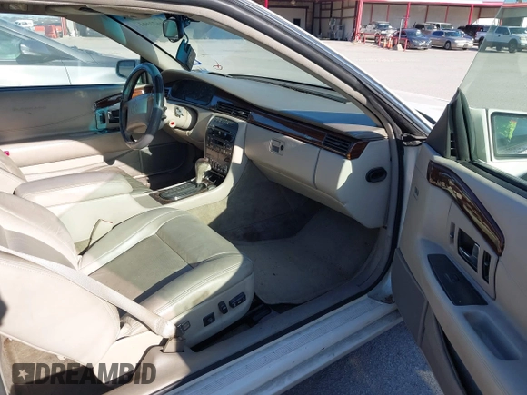 2000 Cadillac Eldorado Touring ETC z VIN 1G6ET1292YU188056, wystawiony jako IAAI lot #41671661 z przebiegiem 139 138 mil mil oraz . Historia ofert i sprzedaży dostępna na DreamBid. Obrazek 5.