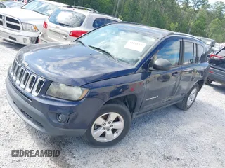 2014 Jeep Compass Sport with VIN 1C4NJCBA4ED594103, listed as a IAAI auction lot 42035379 with 127,161 mi miles. Bid and sale history available at carsss.com. Image 2.