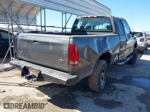 2003 Ford F-150 XL with VIN 1FTRX17L03NA40448, listed as a IAAI auction lot 41473201 with 1 mi miles. Bid and sale history available at carsss.com. Image 4.