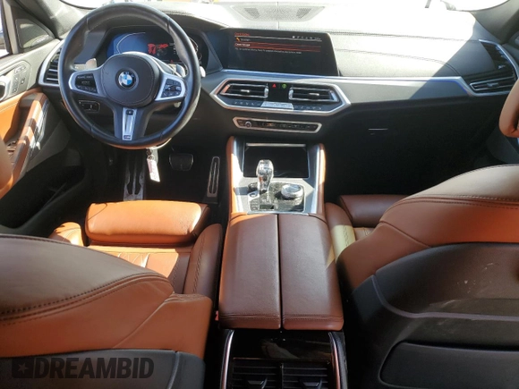 2023 BMW X6 xDrive40i z VIN 5UXCY6C04P9P49005, wystawiony jako Copart lot #51974695 z przebiegiem 30 421 mil mil oraz Szkoda całkowita • Salvage title. Historia ofert i sprzedaży dostępna na DreamBid. Obrazek 8.