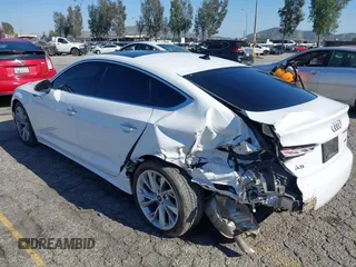 2023 Audi A5 Sportback Premium z VIN WAUABCF56PA039597, wystawiony jako IAAI lot #41979540 z przebiegiem 32 654 mil mil oraz . Historia ofert i sprzedaży dostępna na DreamBid. Obrazek 3.