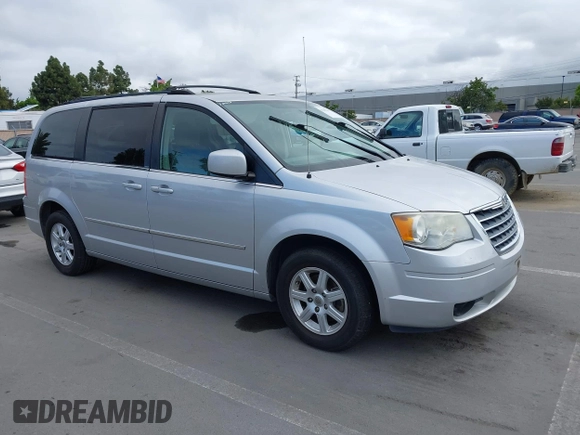 2010 Chrysler Town & Country Touring with VIN 2A4RR5D11AR432126, listed as a IAAI auction lot 42261584 with 135,638 mi miles and . Bid and sale history available at DreamBid. Image 1.