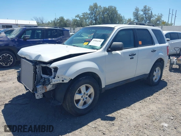 2012 Ford Escape XLT with VIN 1FMCU9DG9CKA09099, listed as a IAAI auction lot 40371699 with 136,707 mi miles and . Bid and sale history available at DreamBid. Image 2.