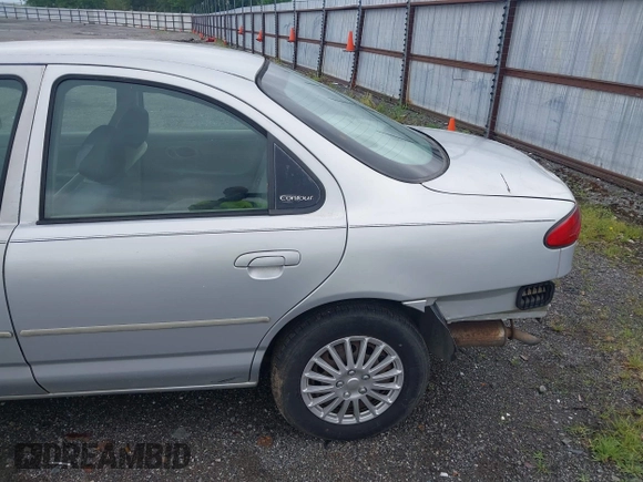 2000 Ford Contour SE Fleet с VIN 1FAFP6630YK140498, выставлен на аукционе IAAI как лот 42201222 с пробегом 264 655 миль миль и . История ставок и продаж доступна на DreamBid. Изображение 15.