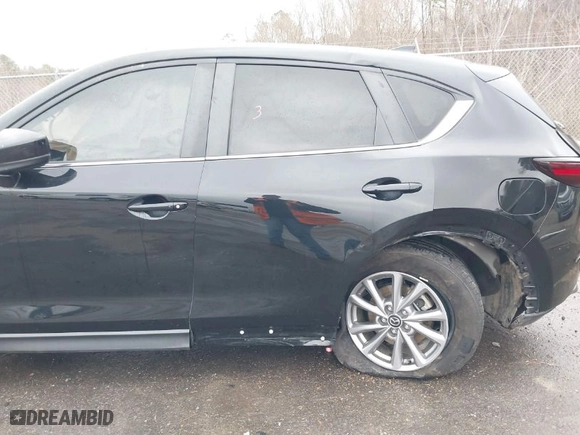2022 Mazda CX-5 2.5 S Carbon Edition with VIN JM3KFBCM9N0579750, listed as a IAAI auction lot 41553088 with NaN miles. Bid and sale history available at carsss.com. Image 13.