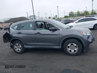 2014 Honda CR-V LX with VIN 2HKRM3H37EH522033, listed as a IAAI auction lot 42139386 with 156,214 mi miles. Bid and sale history available at carsss.com. Image 14.