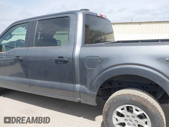 2023 Ford F-150 XL with VIN 1FTFW1E87PKF04735, listed as a IAAI auction lot 42048913 with 54,893 mi miles. Bid and sale history available at carsss.com. Image 14.