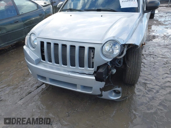 2010 Jeep Compass Sport with VIN 1J4NF4FB3AD589361, listed as a IAAI auction lot 41449412 with 127,807 mi miles. Bid and sale history available at carsss.com. Image 6.