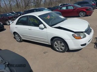 2009 Kia Spectra EX with VIN KNAFE221X95624138, listed as a IAAI auction lot 41823611 with 136,790 mi miles. Bid and sale history available at carsss.com. Image 1.