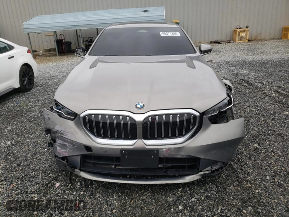 2024 BMW 5 Series 530i xDrive z VIN WBA53FJ09RCS08708, wystawiony jako Copart lot #58371385 z przebiegiem 23 265 mil mil oraz Szkoda całkowita • Salvage title. Historia ofert i sprzedaży dostępna na DreamBid. Obrazek 5.