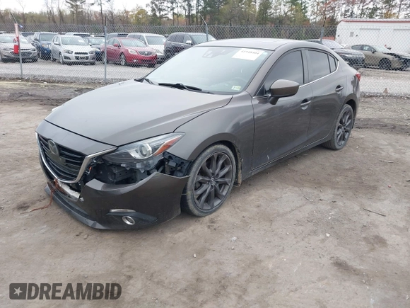 2014 Mazda 3 S Grand Touring with VIN JM1BM1W39E1145186, listed as a IAAI auction lot 41948404 with 111,702 mi miles and . Bid and sale history available at DreamBid. Image 2.