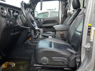 2020 Jeep Wrangler Unlimited Sahara with VIN 1C4HJXEG7LW297722, listed as a Copart auction lot 55295025 with 69,064 mi miles and Salvage title. Bid and sale history available at DreamBid. Image 7.