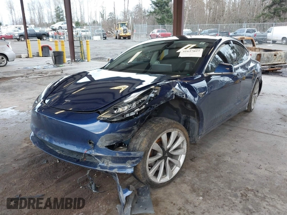 2018 Tesla Model 3 Long Range Battery z VIN 5YJ3E1EA7JF035949, wystawiony jako IAAI lot #41627027 z przebiegiem Nie podano mil oraz . Historia ofert i sprzedaży dostępna na DreamBid. Obrazek 2.